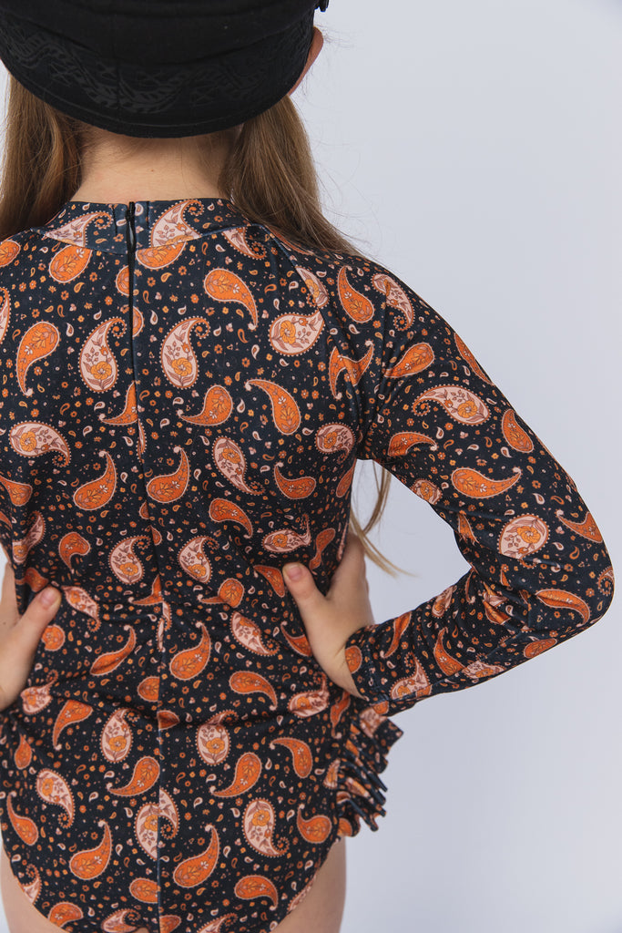 US stockist of Salty Swimwear's long sleeve rashsuit in Midnight Pretty Paisley.  Made from UPF 50+ Repreve fabric.