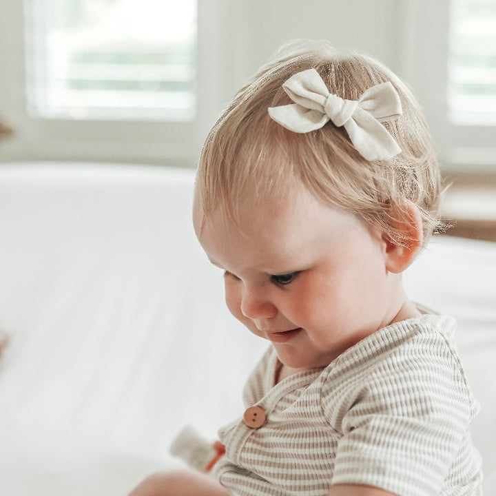 US stockist of Josie Joan's Wendy classic bow clip.  Made from cotton/linen in a neutral off white shade.