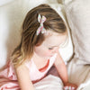 US stockist of Josie Joan's "Mabel" floral petite bow clip.