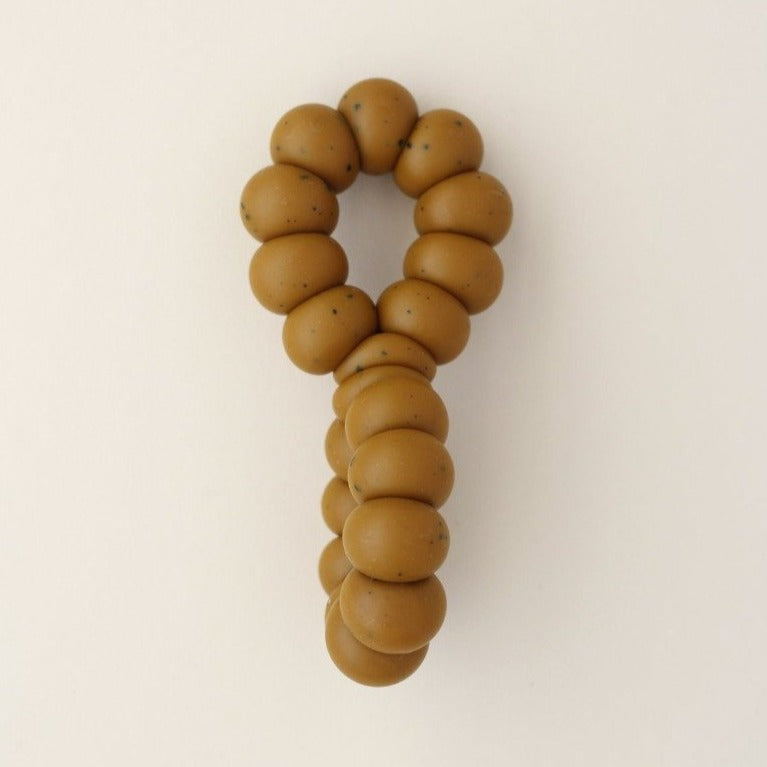 US stockist of Little Chew's gender neutral, Infinity Rust freezer toy.  Pop in the fridge to help soothe those sore gums.