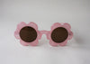 US stockist of Elle Porte's Daisy sunglasses in Fairy Floss Pink with dark lenses.
