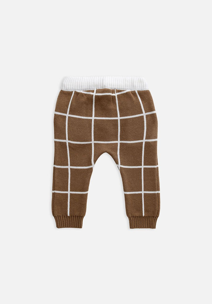 US stockist of Miann & Co's baby knit pants in cafe au lait grid. Made from 100% cotton with elastic waist, functional drawstring and pockets.