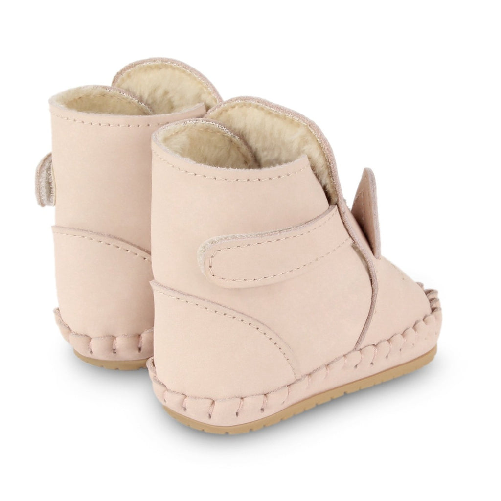 US stockist of Donsje's pale pink leather unicorn baby shoes with Kapi exclusive faux fur lining.  Velcro fastening - soft sole under 12mths.