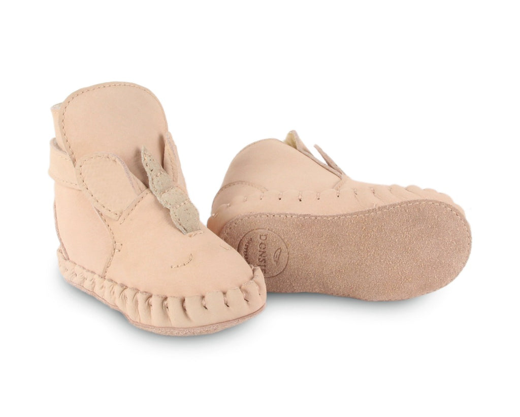 US stockist of Donsje's pale pink leather unicorn baby shoes with Kapi exclusive faux fur lining.  Velcro fastening - soft sole under 12mths.