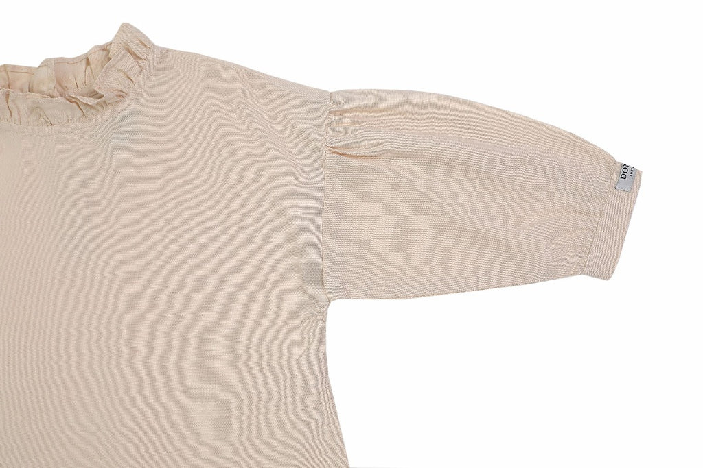 US stockist of Donsje's three quarter sleeve, Kyara Dress in Powder.  Made from a linen blend.