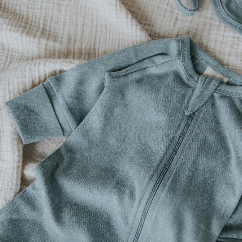 US stockist of Buck & Baa's gender neutral, organic cotton zip romper in Laurel.