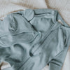 US stockist of Buck & Baa's gender neutral, organic cotton zip romper in Laurel.