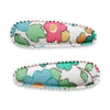US stockist of Josie Joan's Little Kylie set of two fabric baby hair clips.  Cream colored fabric with blue, green flowers and red, yellow berries. Features scalloped edges.