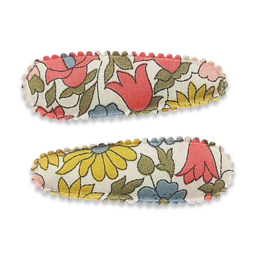 US stockist of Josie Joan's Little Maureen baby hair clip set. Gorgeous cream fabric with blue, pink, red or yellow flowers. 
