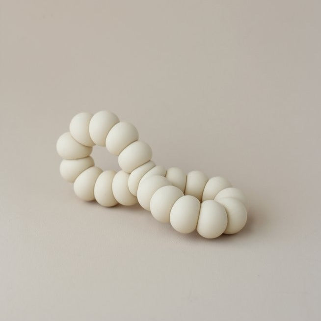 US stockist of Little Chew's gender neutral, Infinity Cream freezer toy.  Pop in the fridge to help soothe those sore gums.