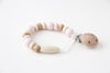 US stockist of Little Chew Silicone pink bee pacifier clip