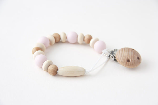 US stockist of Little Chew Silicone pink bee pacifier clip