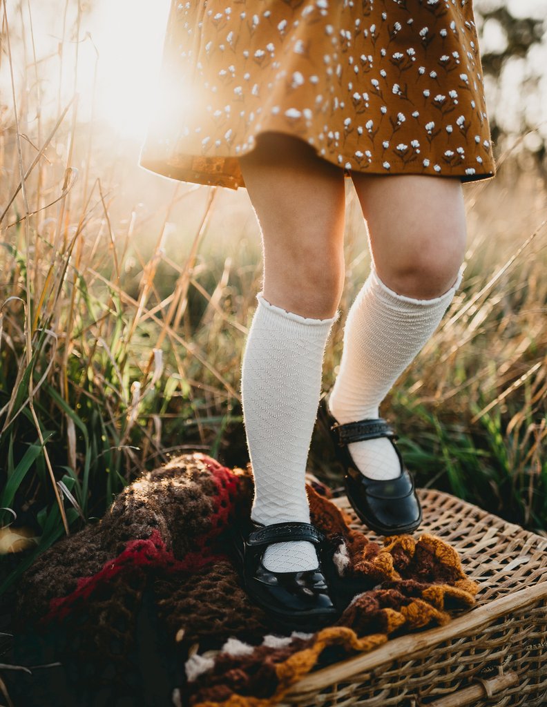 US stockist of Karibou Kid's Macaroon cotton socks. Light beige color with mesh texture and frill at top. Cotton blend.