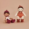 US stockist of Olli Ella's Dinkum Doll Knit Umber Set.  Features cotton knit bonnet and hard sole knit booties with pom poms on front. 