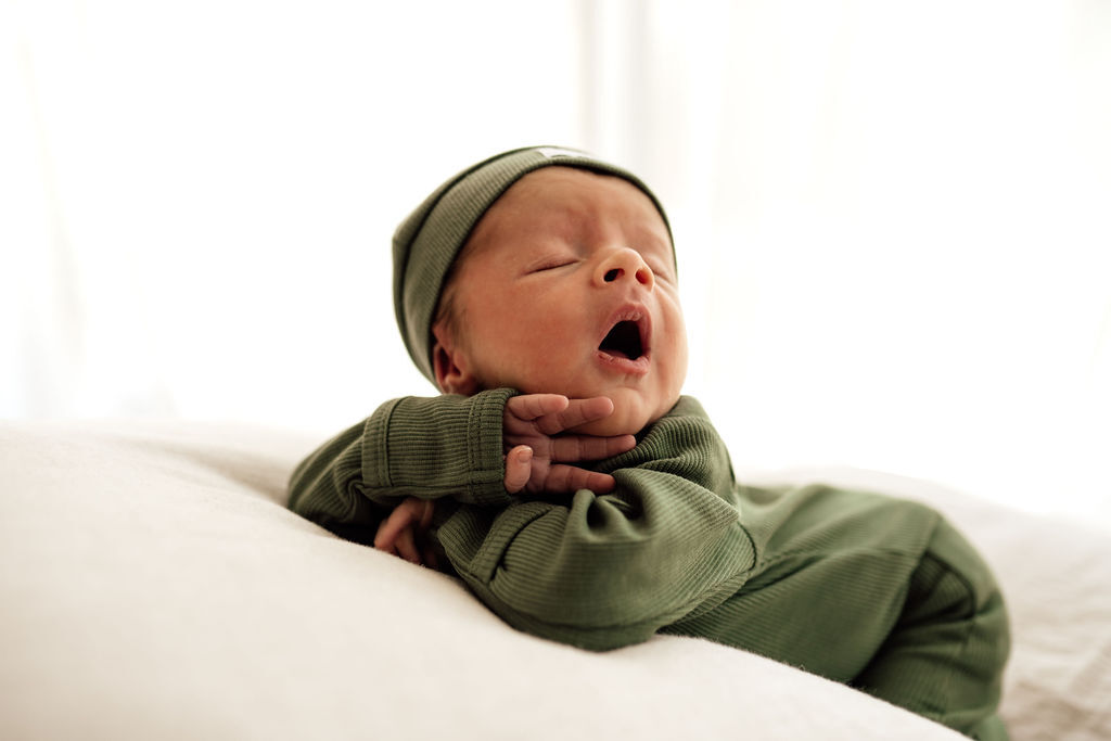 US stockist of Snuggle Hunny Kid's organic jersey Olive zip growsuit.