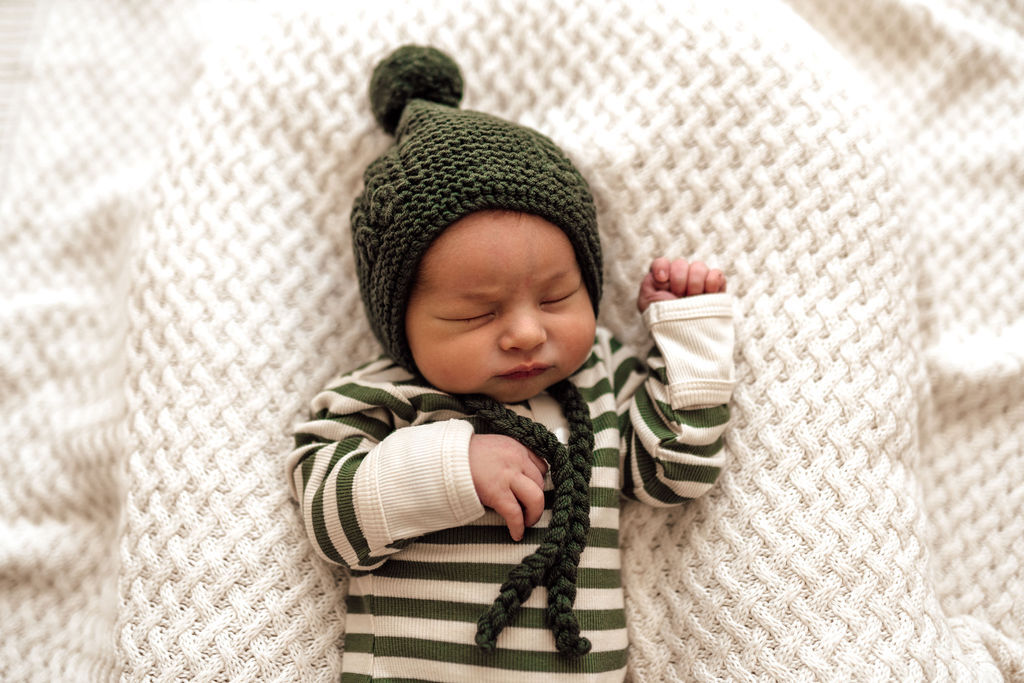 US stockist of Snuggle Hunny Kid's olive stripe zip growsuit.