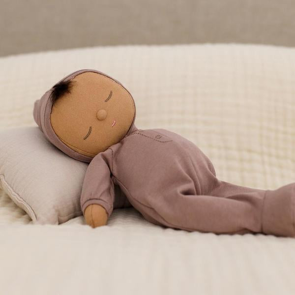 US stockist of Olli Ella's gender neutral, Pip Dozy Dinkum.  Features tuft of brown hair with non removable hooded light purple onesie.