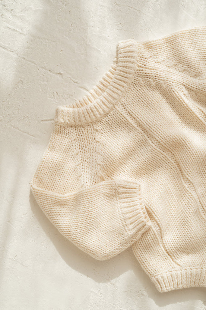 US stockist of Illoura the Label's gender neutral Tallow Romper in Vanilla.