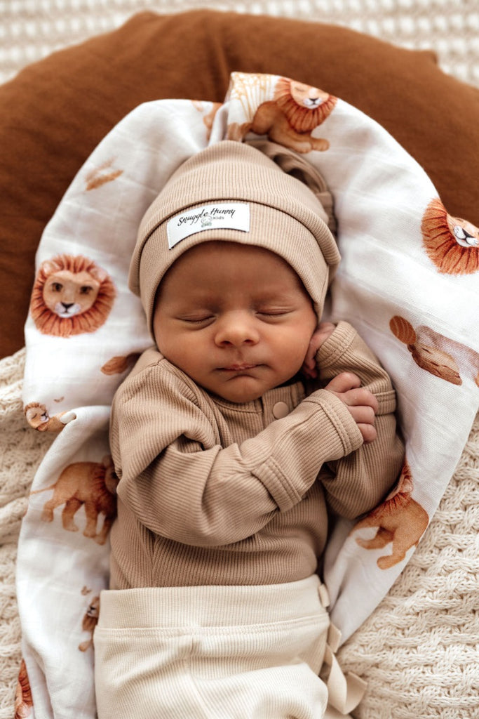 US stockist of Snuggle Hunny Kid's organic jersey Pebble zip growsuit.