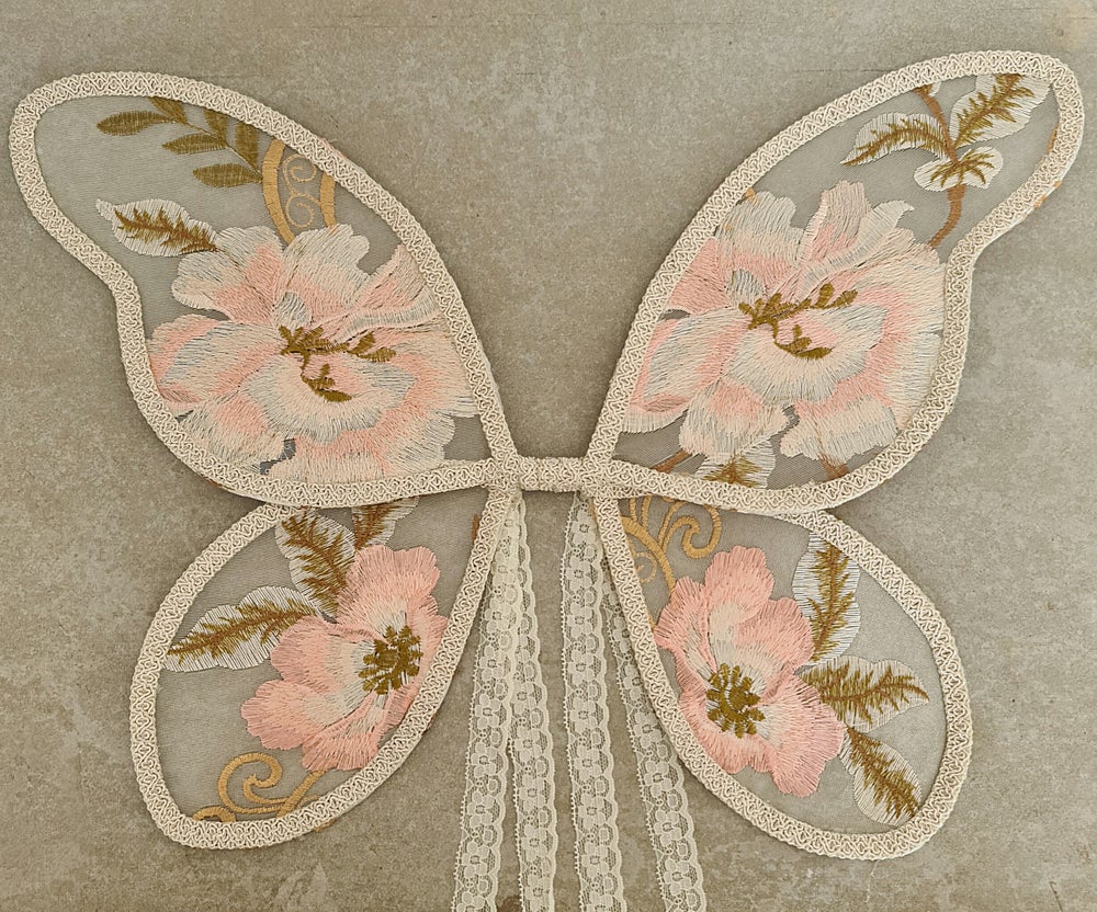 US stockist of Mauve & May's Peony Fairy Wings in size large.