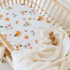 US stockist of Snuggle Hunny Kid's Poppy stretch cotton jersey bassinet sheet. White color with pink and yellow poppy print.