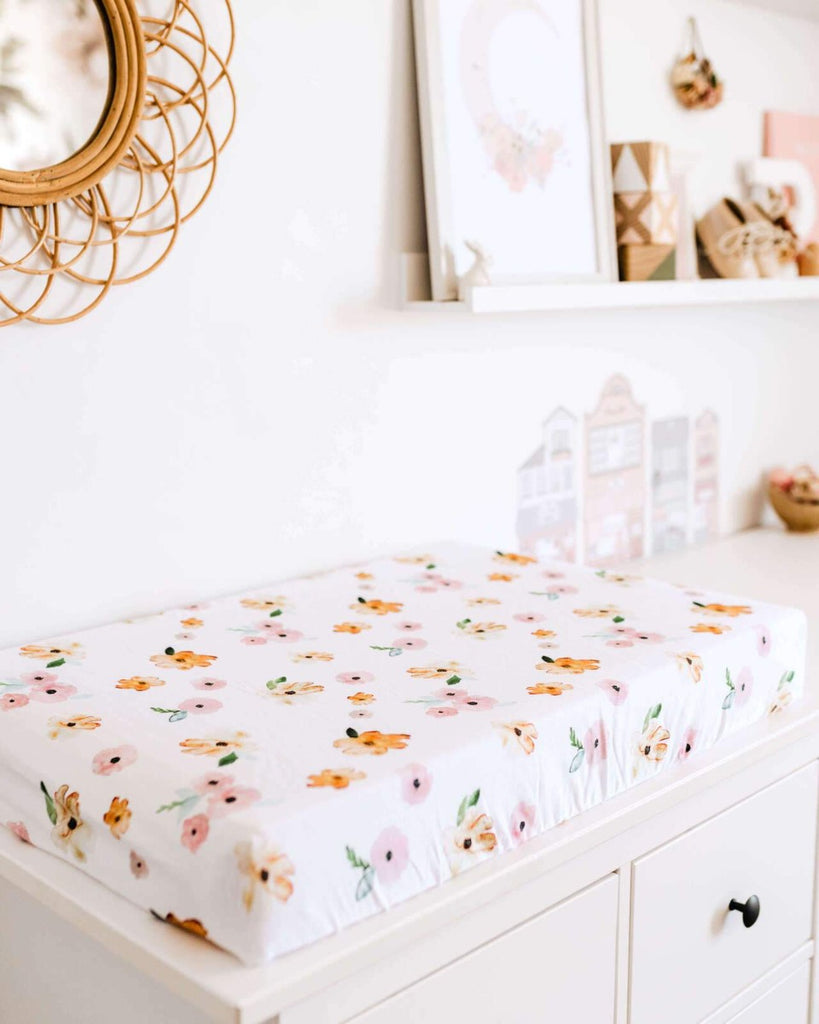 US stockist of Snuggle Hunny Kid's Poppy stretch cotton jersey bassinet sheet. White color with pink and yellow poppy print.