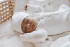 US stockist of Buck & Baa's organic cotton rib zip romper in gender neutral Milk.  