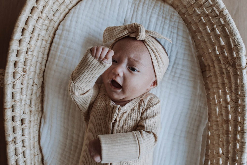 US stockist of Buck & Baa's organic cotton rib zip romper in gender neutral Biscuit.  