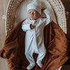 US stockist of Buck & Baa's organic cotton rib zip romper in gender neutral Milk.  