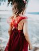 US stockist of Karibou Kid's Scarlett Tutu Dress.  Made from a soft cotton blend with midi length tulle skirt.  Features open back with a big bow.