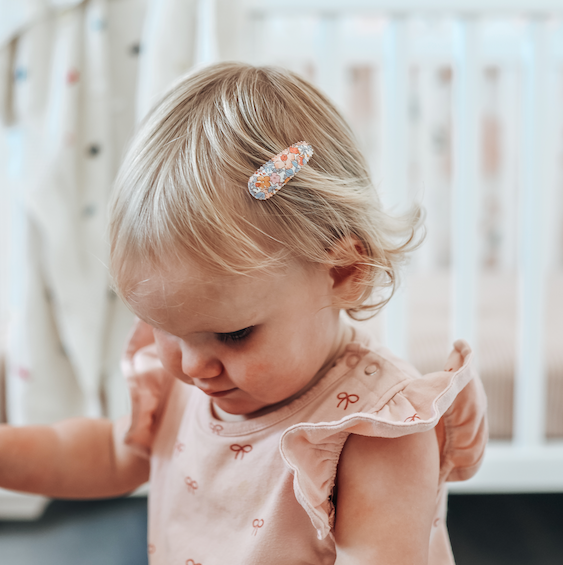 US stockist of Josie Joan's set of two "Little Amelia" fabric snap baby hair clips.
