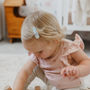 US stockist of Josie Joan's set of two "Little Suzanne" fabric snap baby hair clips.