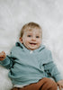 US stockist of Miann & Co's gender neutral slate baby waffle hooded sweatshirt.  Made from 100% waffle cotton.