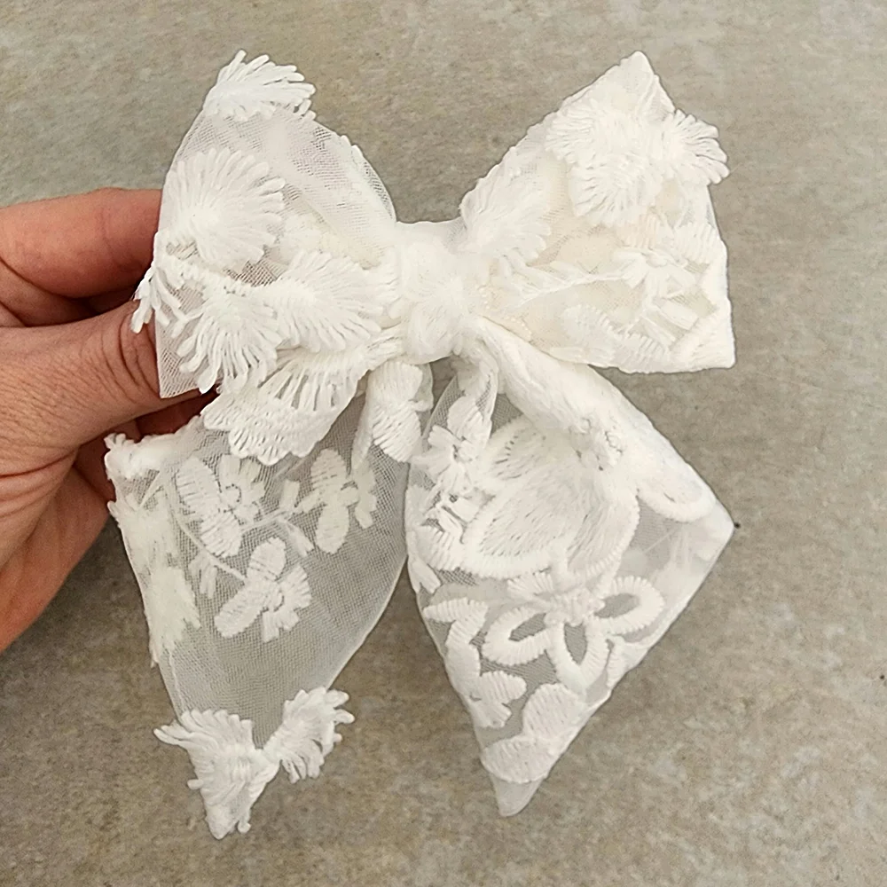 US stockist of Mauve & May's Snow hair bow clip