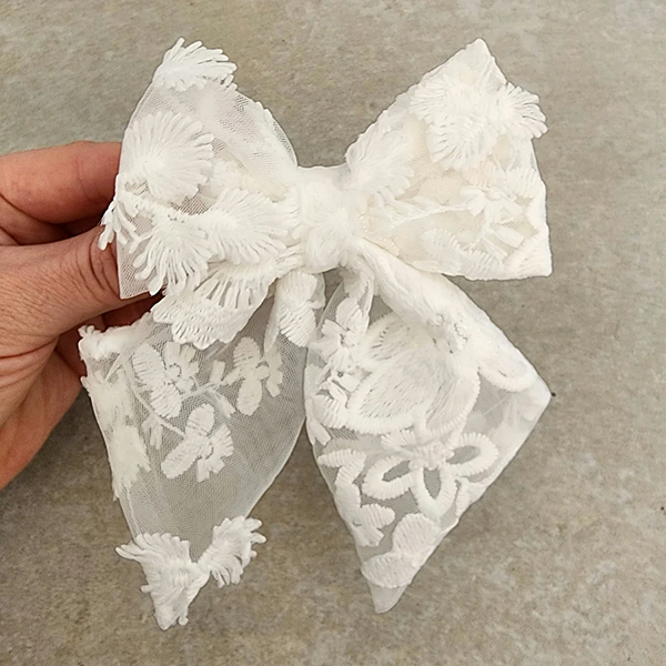 US stockist of Mauve & May's Snow hair bow clip