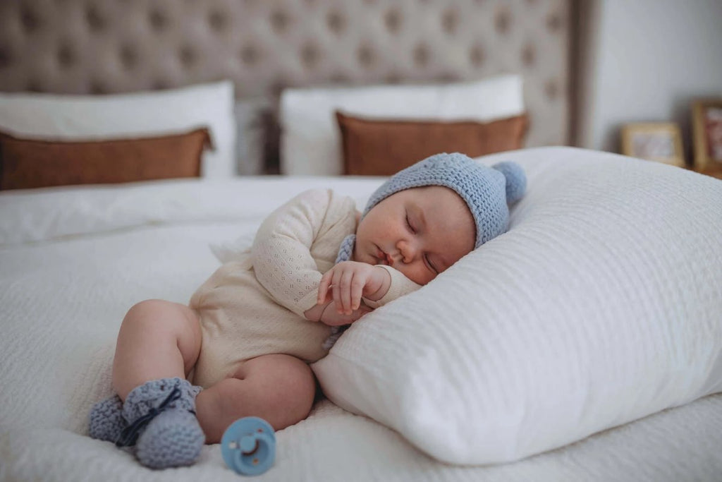 US stockist of Snuggle Hunny Kids blue merino wool bonnet and bootie set