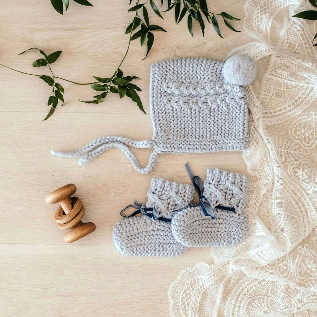 US stockist of Snuggle Hunny Kids blue merino wool bonnet and bootie set