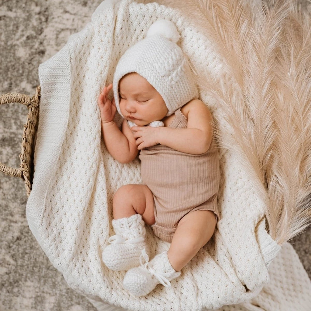 US stockist of Snuggle Hunny Kids ivory merino wool bonnet and bootie set