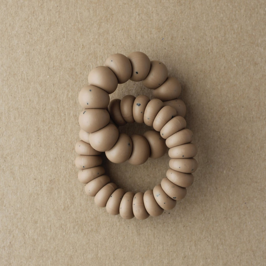 US stockist of Little Chew's gender neutral Luna silicone double freezer teether in speckled truffle.