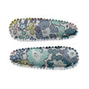 US stockist of Josie Joan's set of two "Little Suzanne" fabric snap baby hair clips.