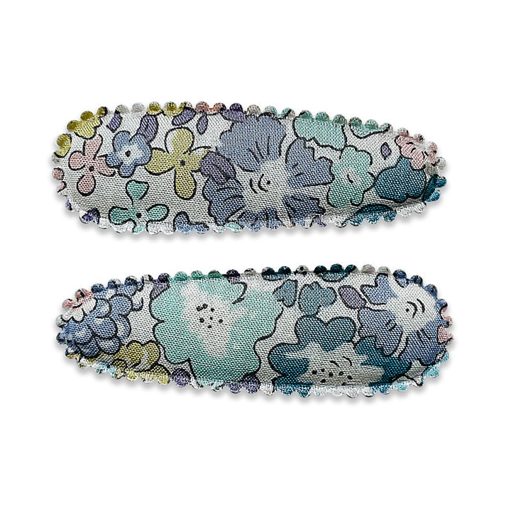 US stockist of Josie Joan's set of two "Little Suzanne" fabric snap baby hair clips.