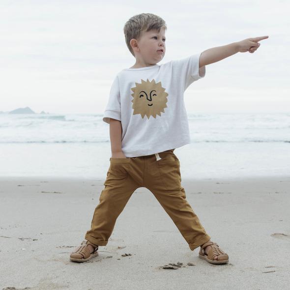 US stockist of Buck & Baa's gender neutral organic cotton tumeric pocket pants.  Features elastic waist with functional drawstring and two front pockets.