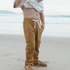 US stockist of Buck & Baa's gender neutral organic cotton tumeric pocket pants.  Features elastic waist with functional drawstring and two front pockets.