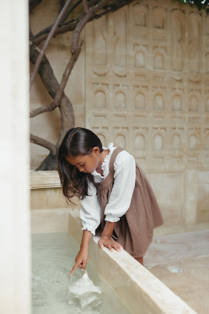 US stockist of Illoura the Label's long sleeve Frankie blouse in white.