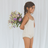 US stockist of Illoura the Label's Olive Scout Onesie.  Made from 100% cotton in a neutral color with olive trim.