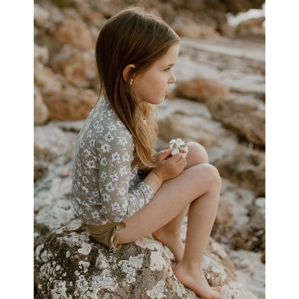 US stockist of Sukoo the Label's long sleeve Belle Rash Top. Made from UPF 50 + Repreve fabric with an all over floral print and invisible zip at back.  Pairs with frill bottoms, sold seperately.