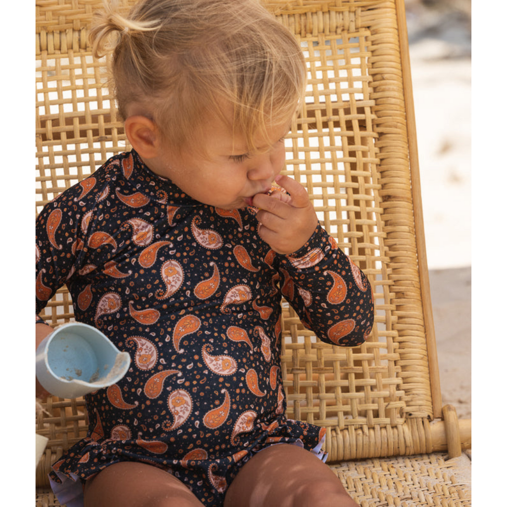 US stockist of Salty Swimwear's long sleeve rashsuit in Midnight Pretty Paisley.  Made from UPF 50+ Repreve fabric.