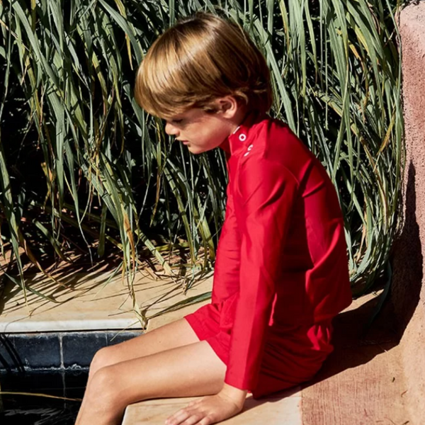 US stockist of Canopea's long sleeved, gender neutral, Turbot rash top in Pepper Red.