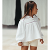 US stockist of Illoura the Label's long sleeve Frankie blouse in white.