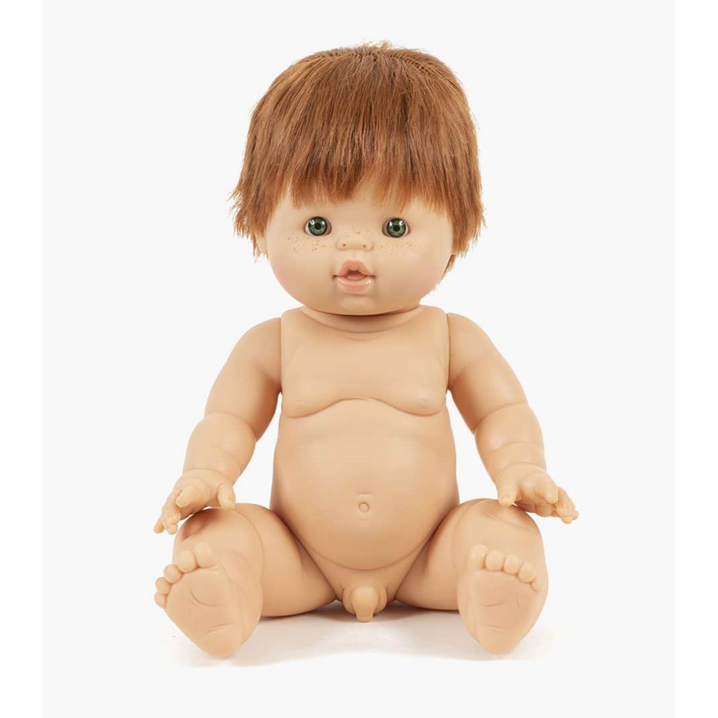 US stockist of Minikane's Raphael boy doll with red hair and green eyes.